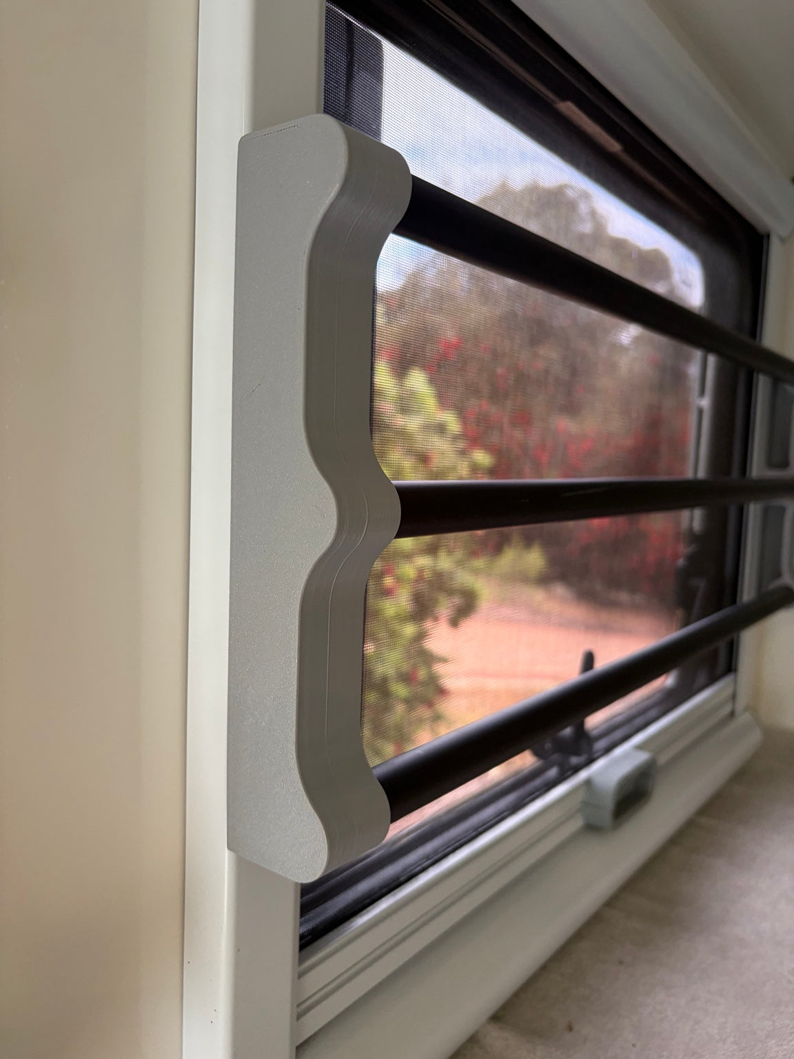 Blind protector installed on caravan window