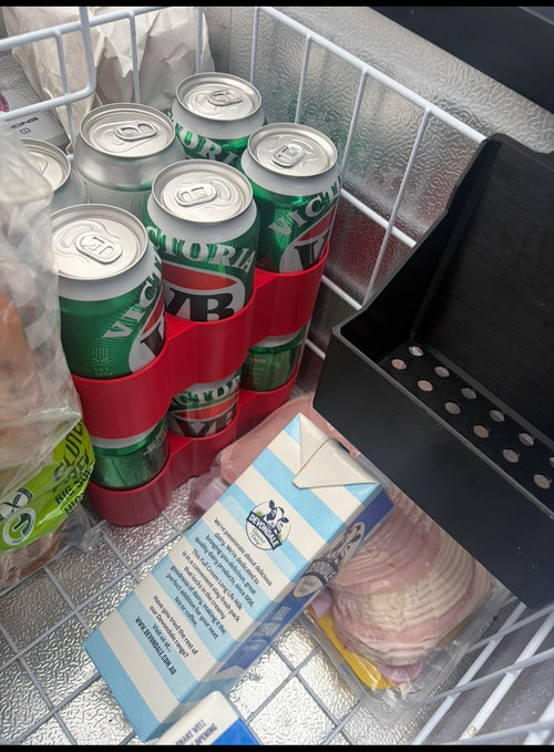 Red Hybrid Prints can organisers stacked inside a caravan fridge
