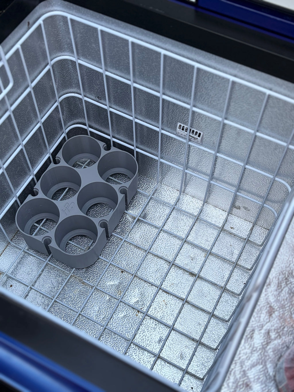 Empty grey Tin - Interlock six-pack showing HP branding